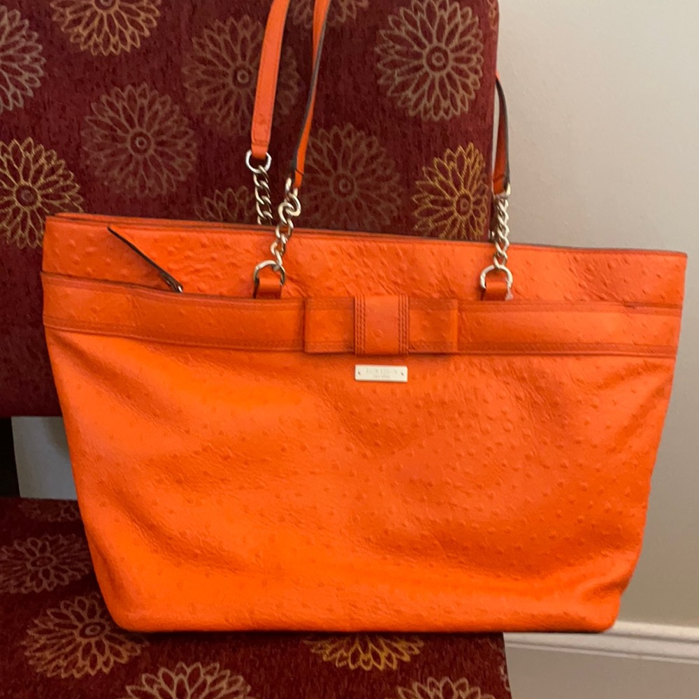 Kate Spade Orange Tote with partial chain straps.